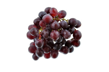 Red grapes on mirror, isolate white background