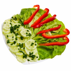 Cucumber slices with chive, lettuce and pepper.