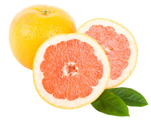 cut red grapefruit with leaves
