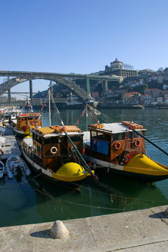 Cityscape with a typical portowine rebelo boat in the foreground