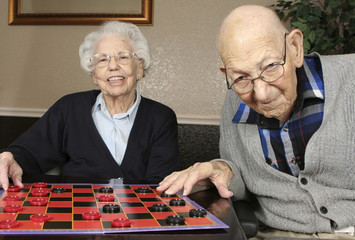 Active Seniors Playing Checkers