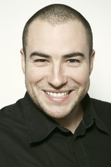 Obraz premium Young man smiling