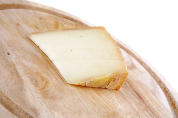 light swiss cheese on wood