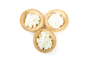 Tartlets with soft cheese isolated