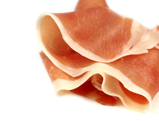 A slice of jamon on white background..