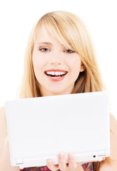 Naklejka premium teenage girl with laptop computer
