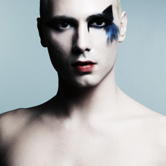 portrait of an actor with strong dramatic make-up