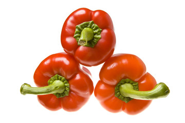 red juicy peppers on white background