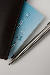 card wallet, pen