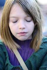 white child meditating