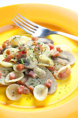 pasta orecchiette with bacon and champignons