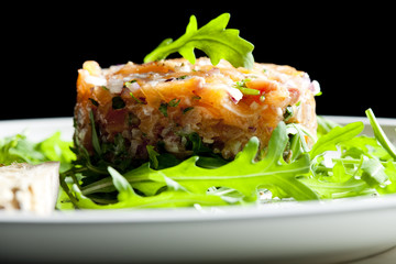 salmon tartare with ruccola