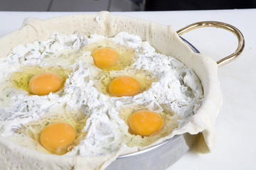 preparing Easter pie. Eggs in stuffing