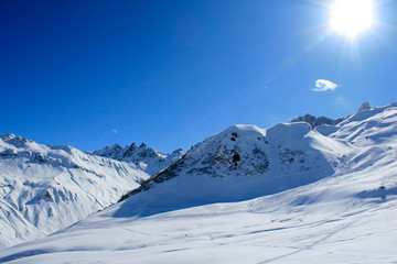 sun in swiss alps