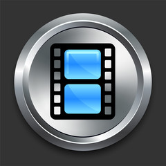 Film Reel Icon on Metal Internet Button