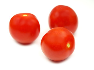 Cherry tomatoes on white background