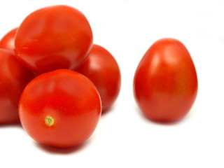 Cherry tomatoes on white background