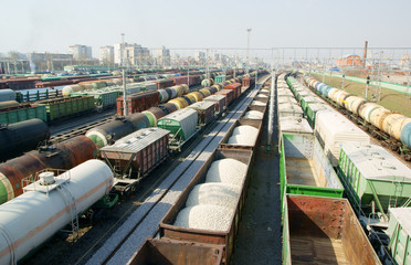Fototapeta na wymiar Many wagons on city cargo terminal