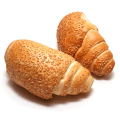 Freshly baked homemade crescent rolls isolated on white