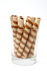 Wafer roll sticks cream rolls in glass