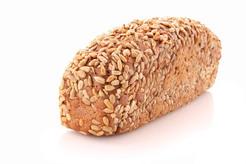 Bread with sunflower seeds isolated on white