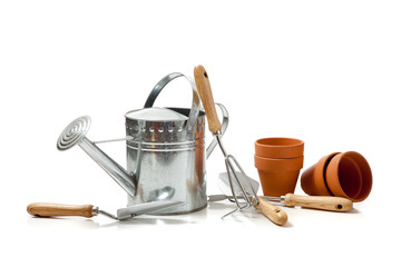 Assorted gardening supplies on a white background