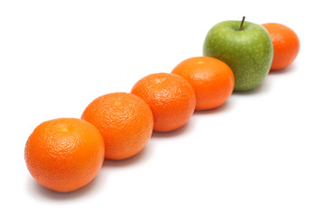different concepts with mandarins and apple