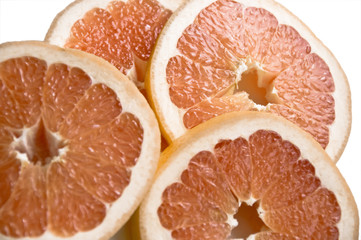 Cut slices of ripe, juicy fresh oranges. Isolation on white