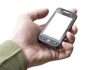 The hand holding a cell phone touchscreen.