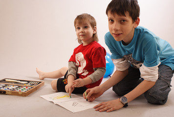 two boys drawing