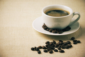 Cup of coffee and beans