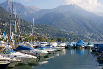 Fototapeta na wymiar Yachts Locarno wharf at lake Maggiore, Switzerland