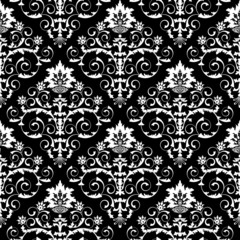 Seamless from leaves and flowers on black background