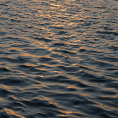 Abstract water surface at sunset
