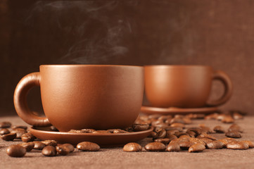 Cups of coffee and beans