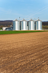 silo in beautiful landscape in sun © travelview