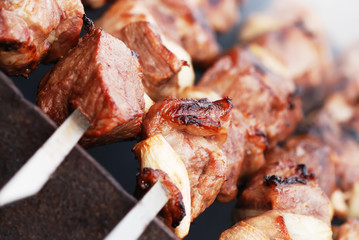 Meat cooking on a skewer