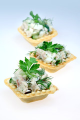 Salad in a baked tartlet
