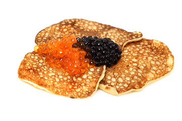 Salmon  and beluga caviar with russian pancakes