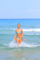 woman on the beach in Greece