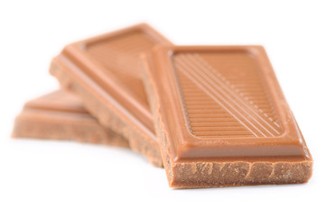 three chocolate bars isolated on white