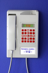 Wall phone with  emergency number