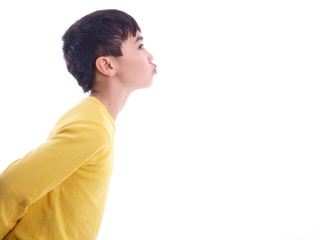 child greets with a kiss on the cheek