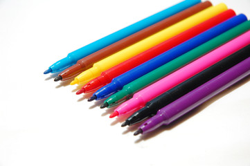 close up of color pen with white background