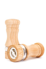 Wooden saltcellar and mill for pepper over white