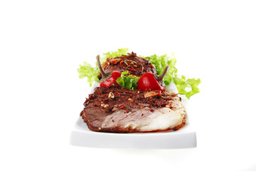 served beef steak on plate