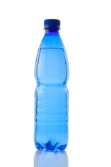A bottle of mineral water reflected on white background