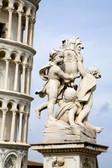 Fototapeta na wymiar Pisa - angles sculpture and hanging tower