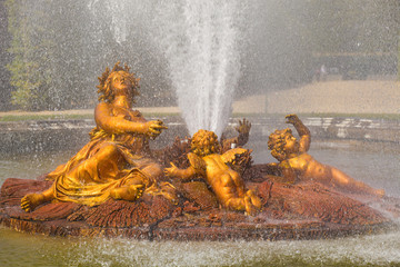 The Ceres fountain spraying water in Versailles Chateau. France