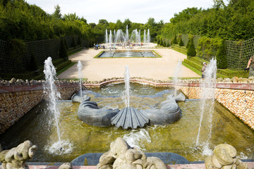Grove of the Three Fountains spraying water. Versailles Chateau